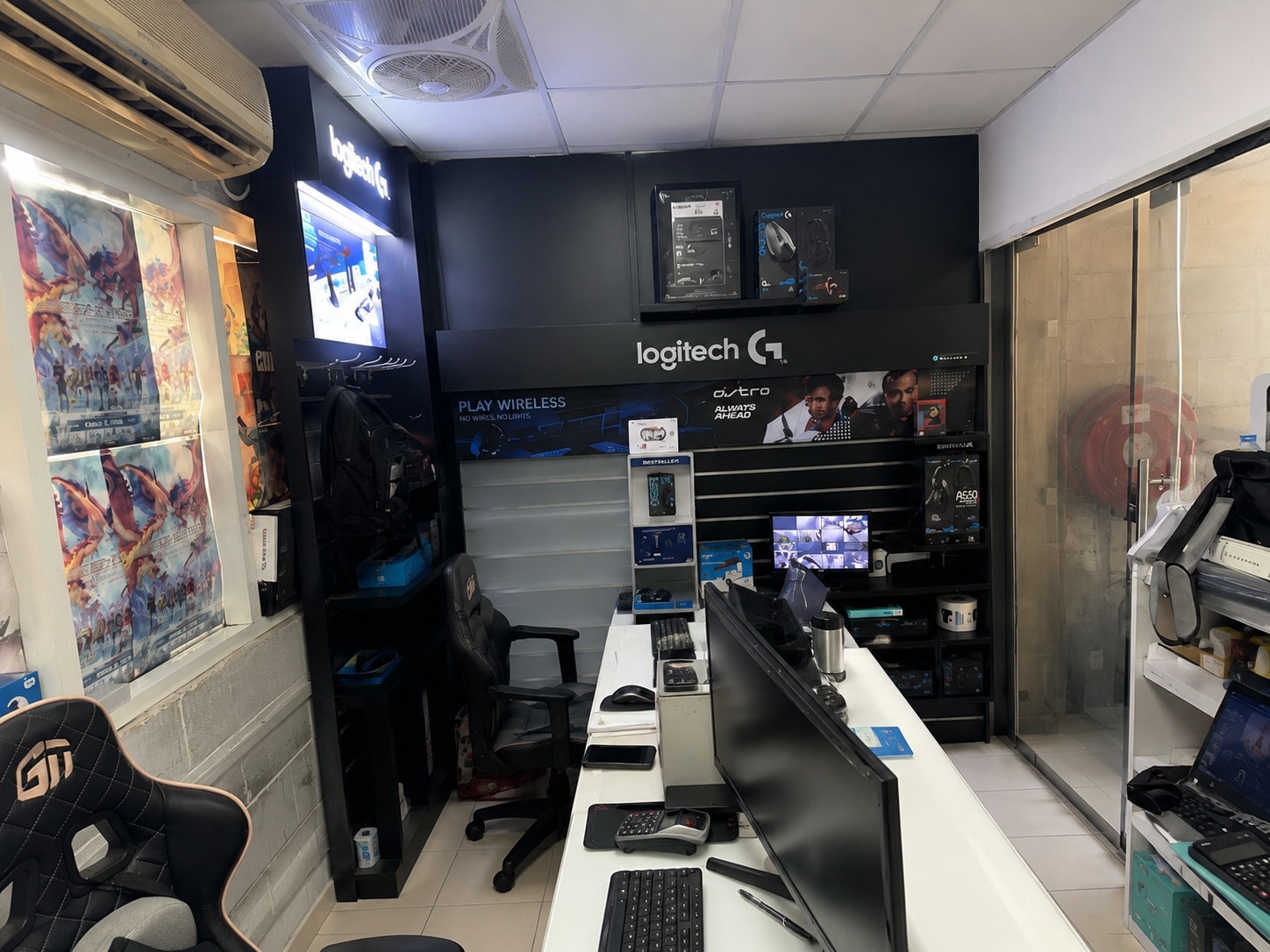 Fidahusain Trading warehouse — stocked shelves with tech brands